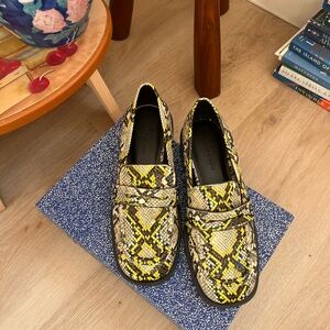 Charles & Keith Yellow and Black Snake Print Loafers